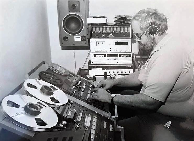 Celebrated WZZQ music director David Adcock sits at his former recording studio in downtown Jackson.