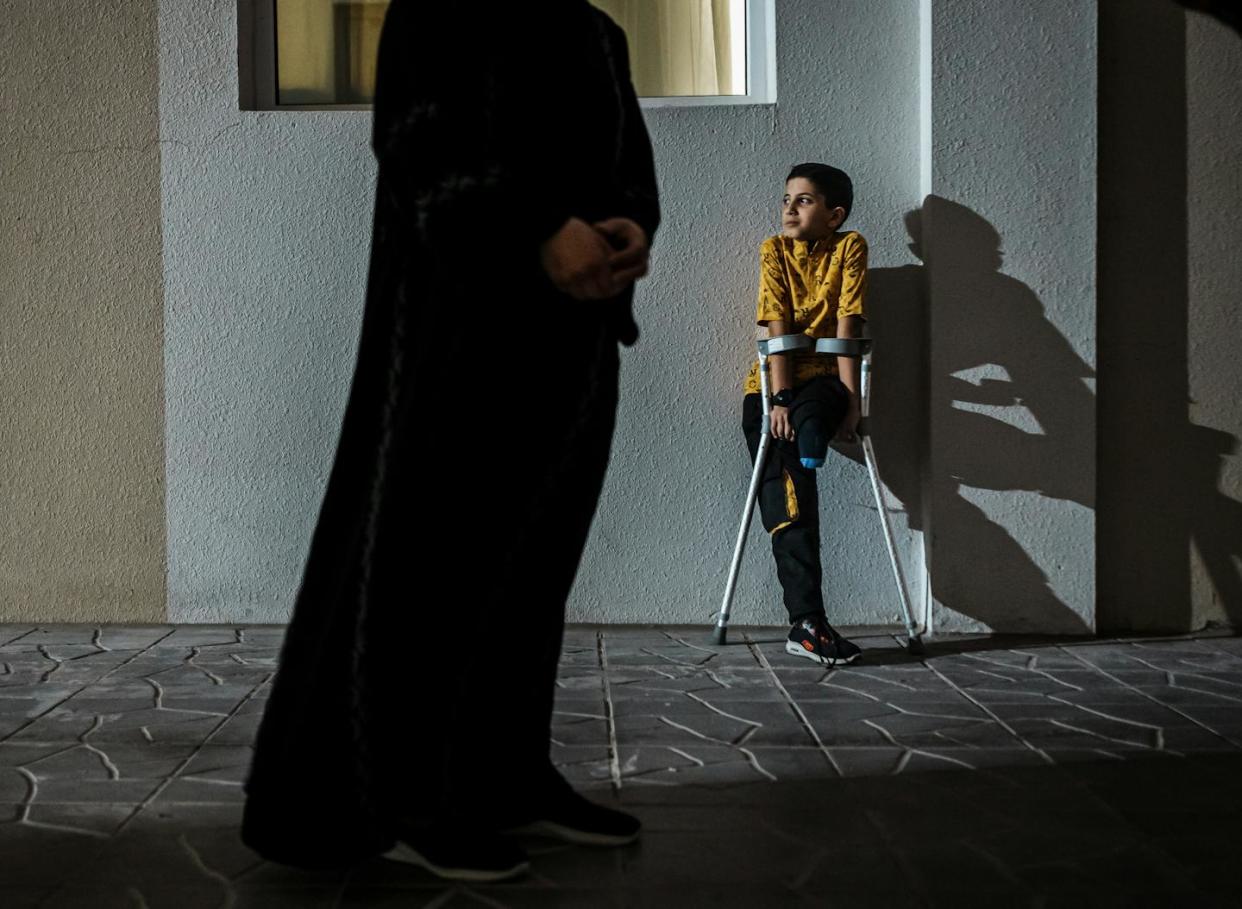 A Palestinian boy from Gaza at a temporary housing compound in Doha, Qatar, in April 2024. <a href="https://www.gettyimages.com/detail/news-photo/palestinian-children-from-gaza-at-a-housing-compound-in-news-photo/2149560226?adppopup=true" rel="nofollow noopener" target="_blank" data-ylk="slk:Marcus Yam/Los Angeles Times via Getty Images;elm:context_link;itc:0;sec:content-canvas" class="link ">Marcus Yam/Los Angeles Times via Getty Images</a>