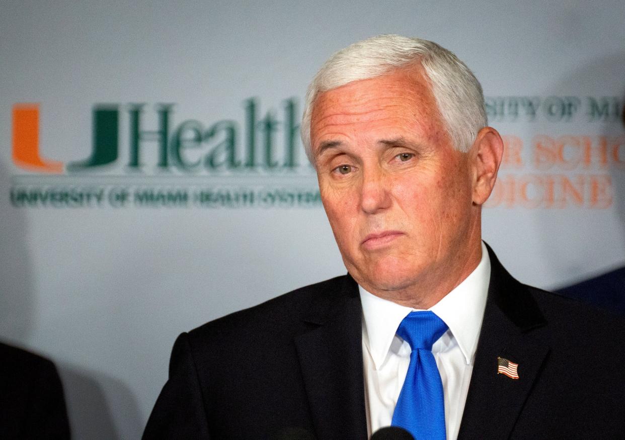 Mike Pence at a coronavirus vaccine roundtable in Miami, Florida: EPA