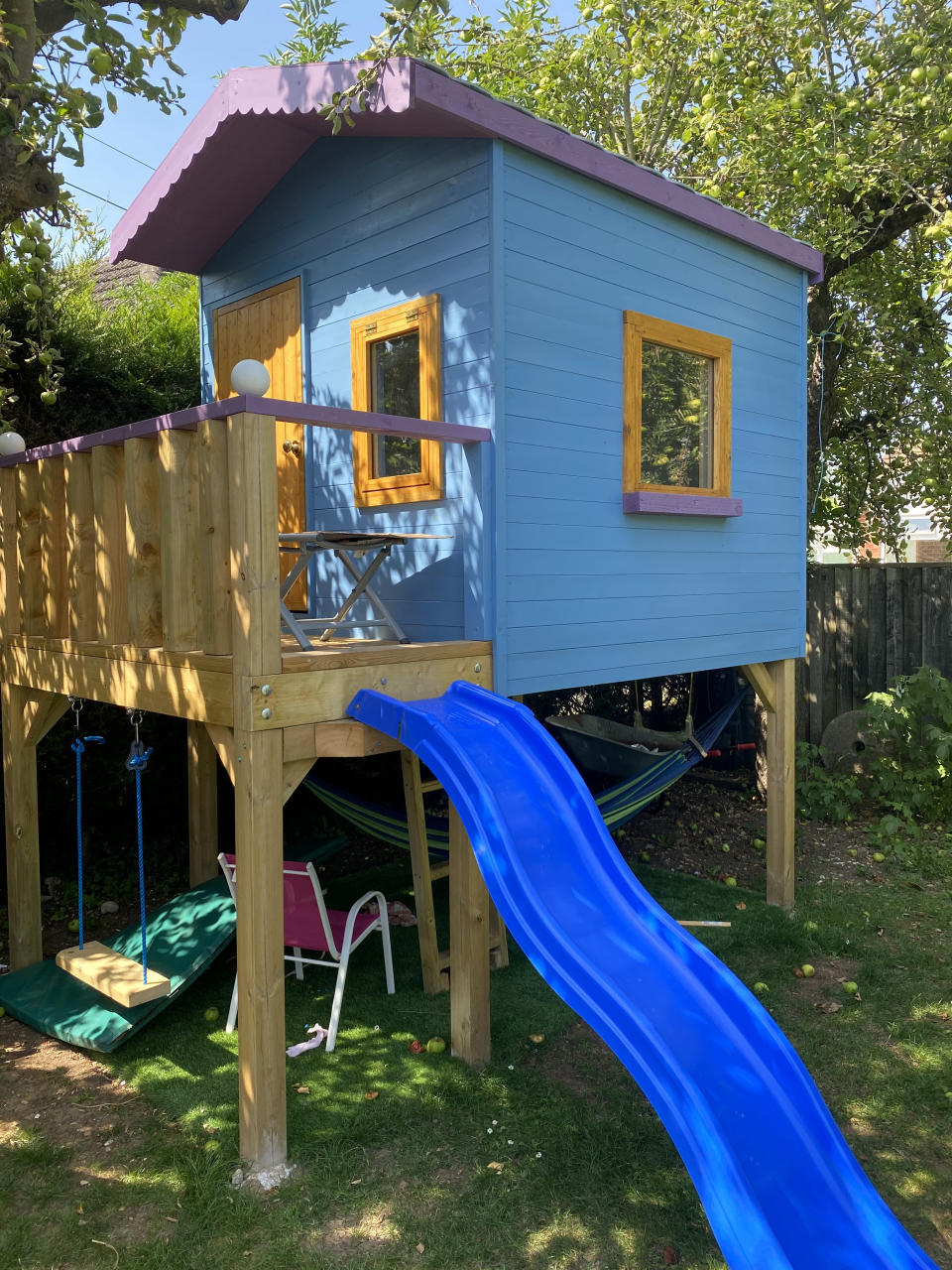 These pictures show a family of four who paid £500 to spent the night in a PLAYHOUSE - that was posted on Airbnb as a joke. Ollie and Kady Hammond had a 'mini break' on Saturday eve in the child's toy house - with their kids Beau, five, and Brooke, ten. They snapped up the booking after it was posted as a prank by Jason Kneen, 49. He built the 8ft (2.4m) by 6ft (1.8m) structure in his garden during lockdown. The dad-of-five then advertised it on the popular travel website for a laugh - but didn't actually think anyone would stump up to stay.