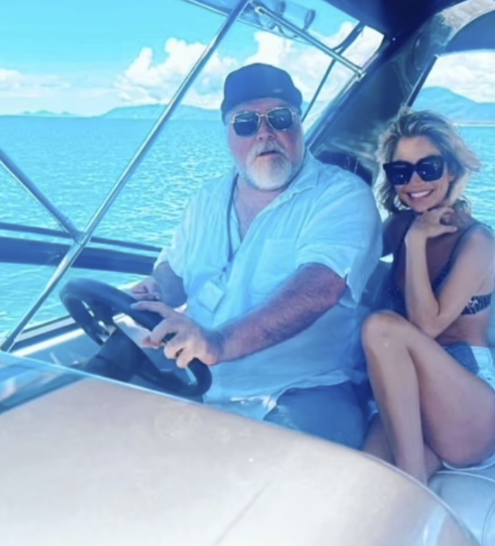 Kyle Sandilands and Tegan Kynaston on a boat