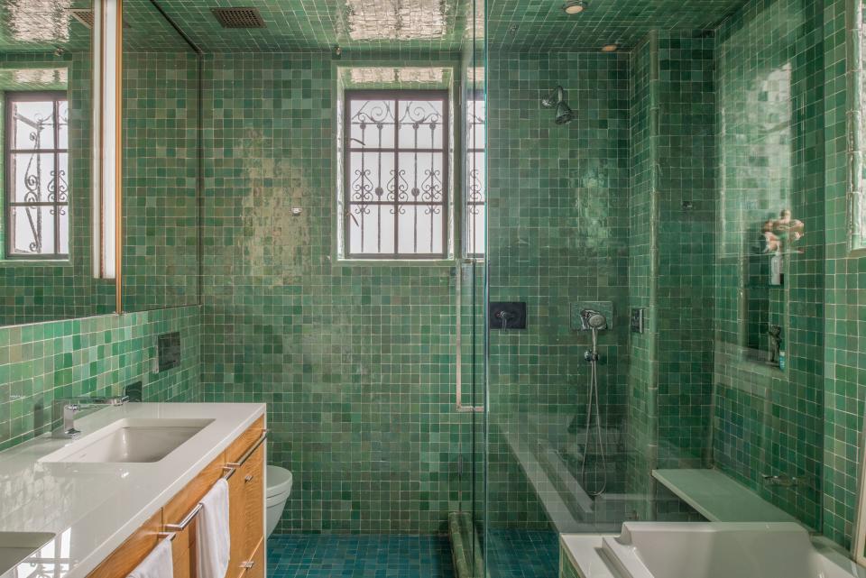 The teal bathroom, one of Linda’s favorite rooms in the house, is inspired by traditional Turkish baths.