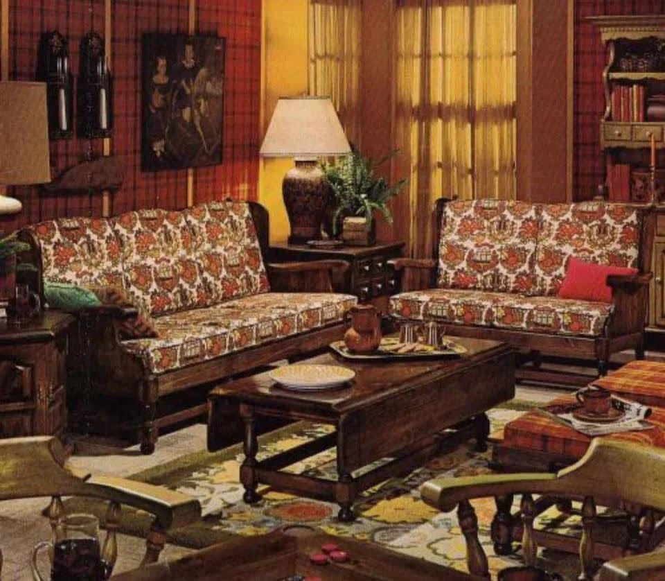 living room in the 1970s with tartan wallpaper and a patterned couch
