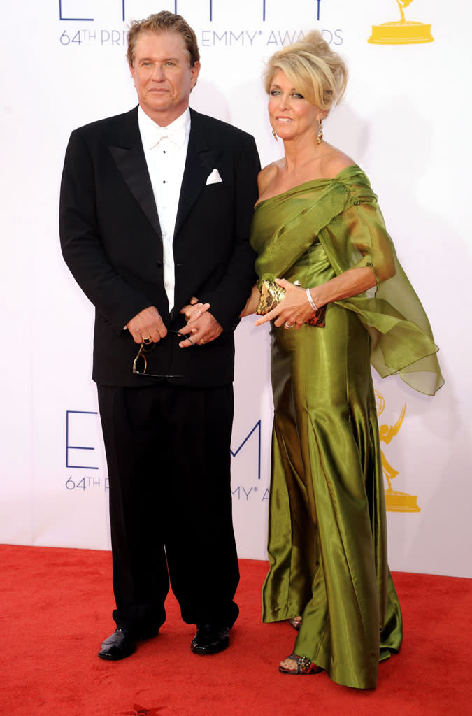 Tom Berenger and Patricia Alvaran arrive at the 64th Primetime Emmy Awards at the Nokia Theatre in Los Angeles on September 23, 2012.