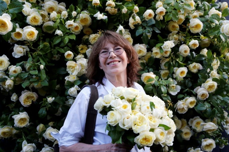 Jane Birkin poses at the Tuileries gardens in Paris in 2015, during the baptism of the Amnesty International rose, created by French plant nursery and rosarium Delbard for the NGO