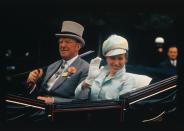 <p>Arriving at the Royal Ascot Race with her escort, the Duke of Beaufort.</p>