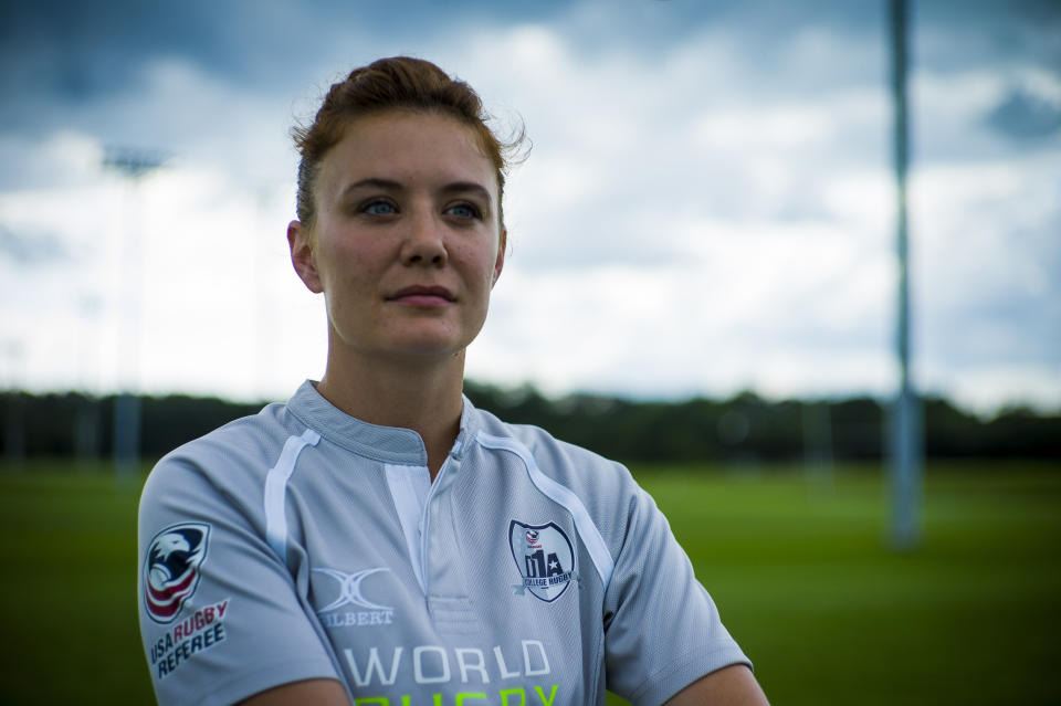 Rugby referee Gray Montrose poses for a photo at Dorey Park and Recreation Center in Henrico, Va., July 21, 2023. Montrose has been involved in the sport of rugby since she was a young teenager either as a competitor or referee. In 2021 Montrose filed a complaint with SafeSport that she was groped by another referee while driving him to a college tournament in Virginia. The referee was given six-months probation, but after Montrose expressed concern about his return to the sport, the center turned around and opened a case against her. (AP Photo/John C. Clark)