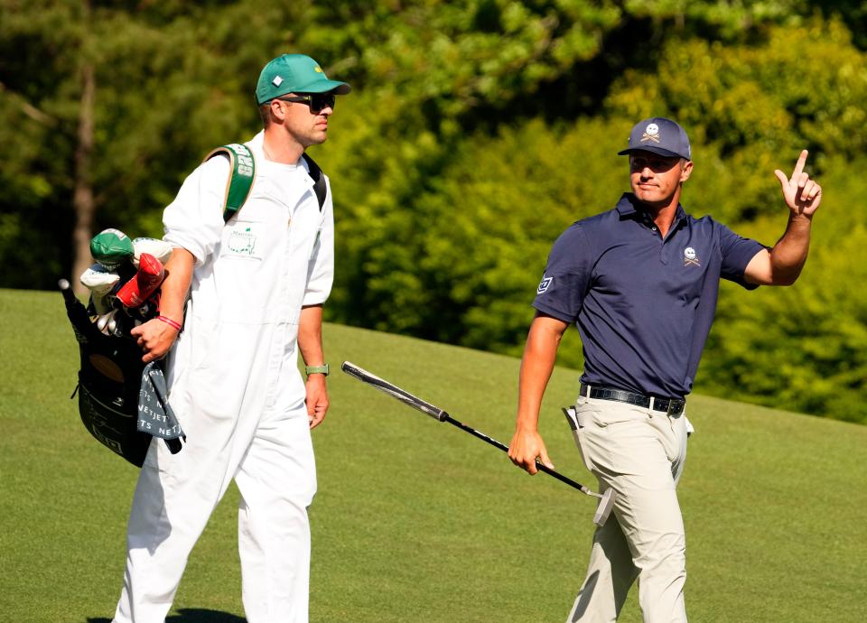 Bryson DeChambeau acknowledges the gallery after teeing off on No. 12 during the final round of the Masters Tournament.