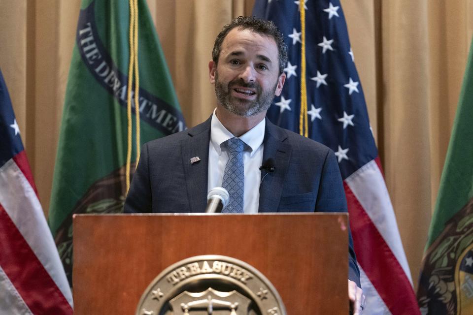 FILE - Internal Revenue Service (IRS) Commissioner Danny Werfel speaks during his swearing-in ceremony at Internal Revenue Service (IRS) headquarters in Washington, Tuesday, April 4, 2023. The IRS released details Thursday, April 6, on how it plans to use the $80 billion it's getting to improve operations, promising investments in new technology, hiring more customer service representatives and expanding its ability to audit high-wealth taxpayers. Contrary to unfounded alarmist talk from Republicans, it won't include spending for new IRS agents with guns, says IRS Commissioner Daniel Werfel. (AP Photo/Jose Luis Magana, File)