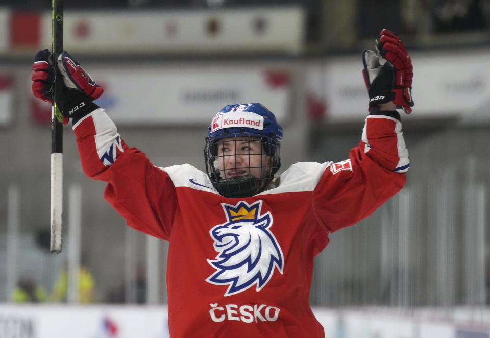 FILE - Czechia forward Katerina Mrazova reacts after scoring against Finland during the second period of a match at the Women's World Hockey Championships in Brampton, Ontario, Thursday, April 13, 2023. Ottawa's yet to be named Professional Women's Hockey League franchise might go by The Ambassadors in the interim. That's because the Canadian capitol team's roster features the largest mix of international talent of the newly established league's six franchises when play opens next week. (Nathan Denette/The Canadian Press via AP, File)