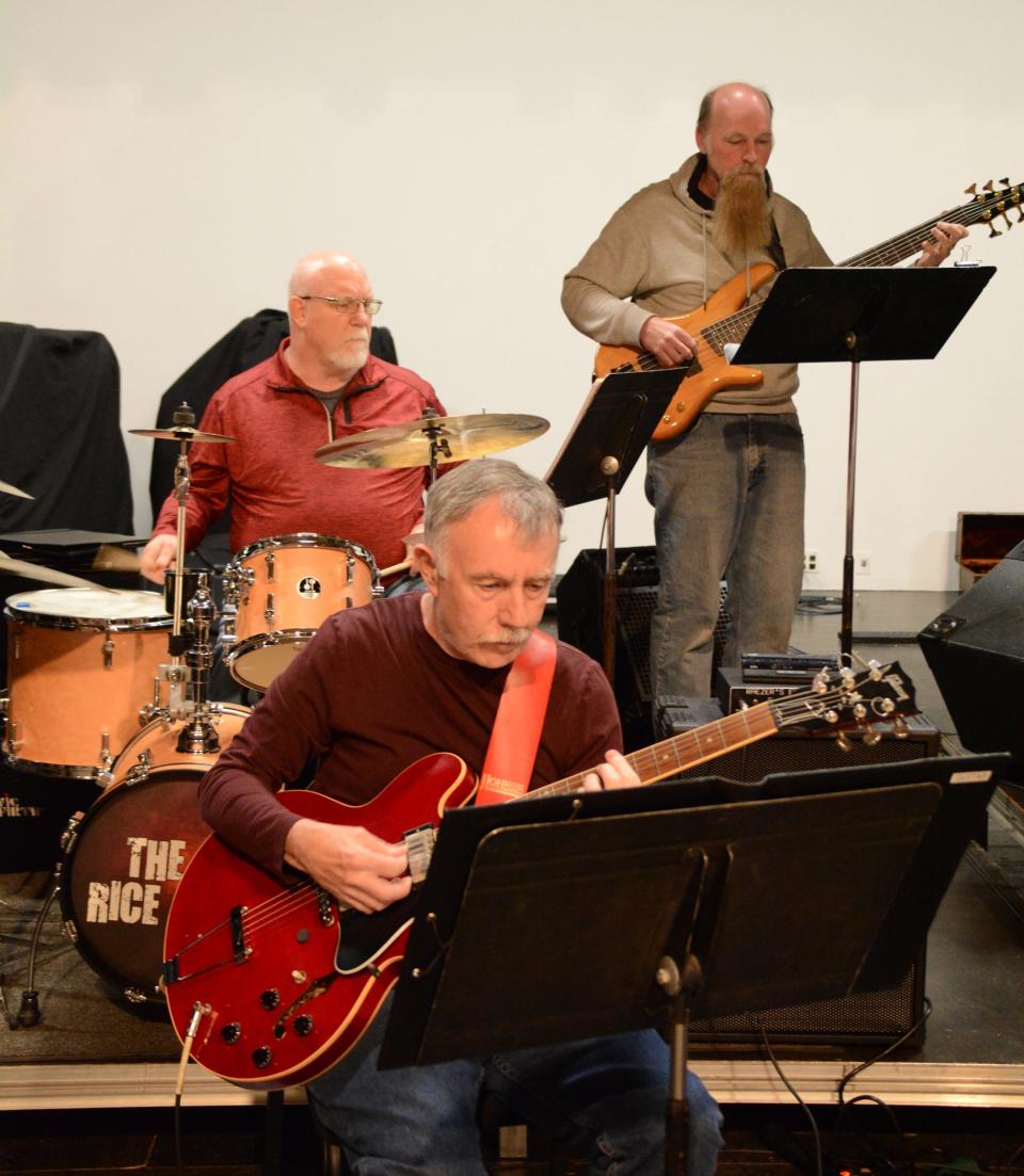 Philip Eversden, guitar; Joe (Carey) Tuckey, drums; and Dana Gillin, bass, rehearse for the Tecumseh Players and TCA Big Band & VocalAires's presentation of the WTCA Radio Show, "A Christmas Carol," Saturday, Dec. 10, and Sunday, Dec. 11, at the Tecumseh Center for the Arts.