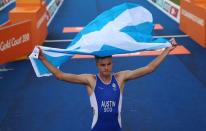 Triathlon - Gold Coast 2018 Commonwealth Games - Men's Final - Southport Broadwater Parklands - Gold Coast, Australia - April 5, 2018 - Marc Austin of Scotland after finishing in third place. REUTERS/Athit Perawongmetha