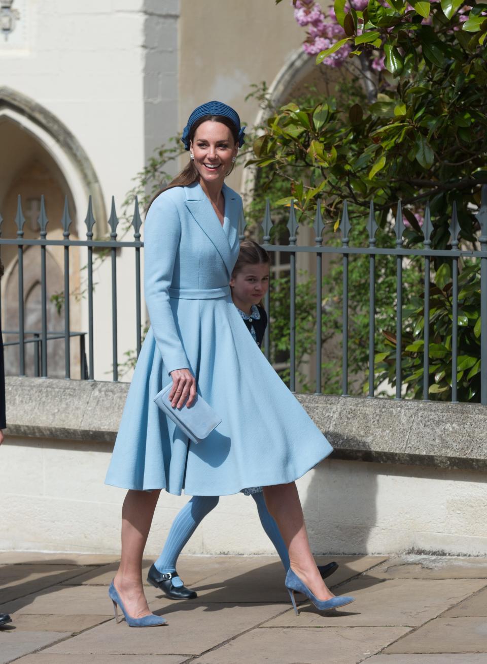 Kate Middleton with Princess Charlotte attend the traditional Easter Sunday Church service at St Georges Chapel in the grounds of Windsor Castle on April 17, 2022