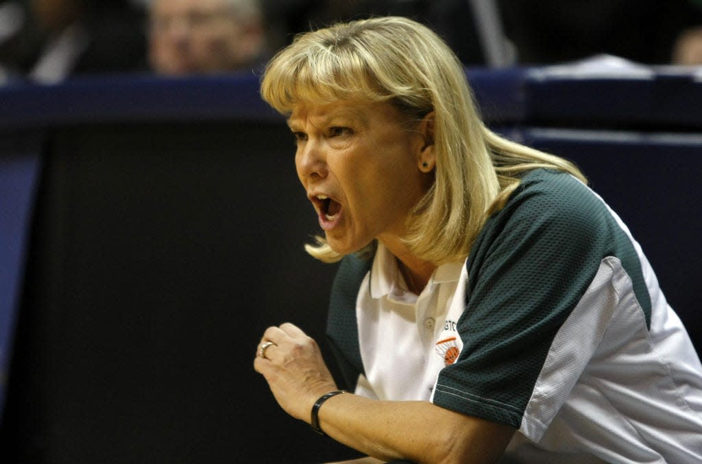 South Bend Washington girls basketball coach Marilyn Coddens instructs her team during the Class 4A state championship game versus Carmel in 2008.