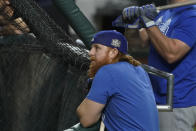 Los Angeles Dodgers third baseman Justin Turner watches during batting practice before Game 5 of the baseball World Series against the Tampa Bay Rays Sunday, Oct. 25, 2020, in Arlington, Texas. (AP Photo/Tony Gutierrez)