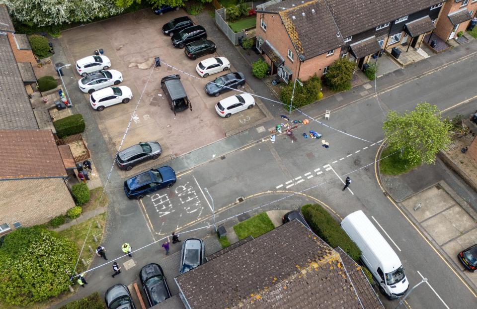 An aerial view of police officers working at the scene after a sword attack (Getty Images)