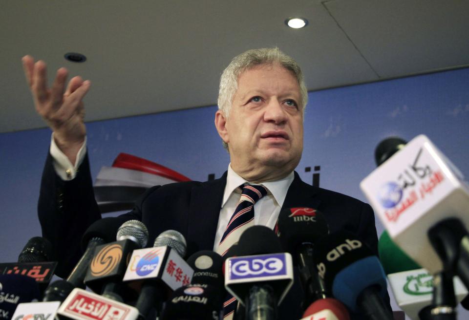 FILE - In this April 6, 2014 file photo, Murtada Mansour, lawyer and chairman of Zamalek FC, speaks during a press conference in Cairo, Egypt. Mansour, chairman of Al-Ahly’s archrival, has gained notoriety with vulgar outbursts, but there has been an attempt to curb his behavior by the Confederation of African Football and the Egyptian Olympic Committee with sanctions imposed. Mansour threatened to burn down CAF’s Cairo headquarters. (AP Photo/Lobna Tarek, El Shorouk, File)
