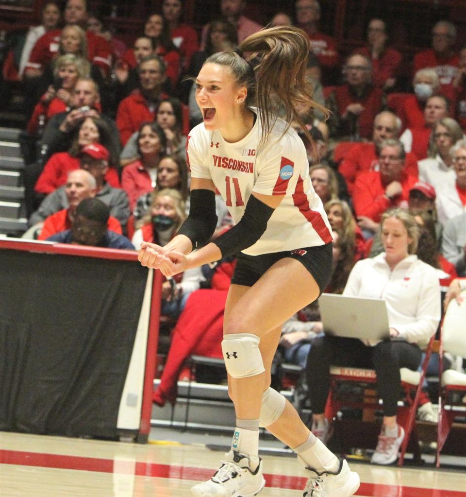 Wisconsin's Izzy Ashburn celebrates a point during an NCAA first-round tournament match against Quinnipiac on Dec. 2 at the UW Field House. Ashburn, a senior setter, leads the Badgers in assists this season.