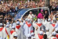 Around 100,000 people gathered in Palmero to hear the pope's mass, according to officials