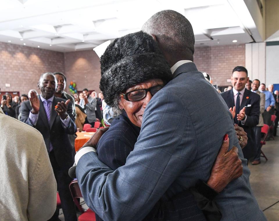 Hattie Estella Williams, left, gets a hug from Anderson Mayor Terence Roberts as he honored her with the Trailblazer award on Friday at the Mayor's Martin Luther King, Jr. Breakfast at the Civic Center of Anderson. Ken Ruinard/Independent MailHattie Estella Williams, left, gets a hug from Anderson Mayor Terence Roberts as he honored her with the Trailblazer award on Friday at the Mayor's Martin Luther King, Jr. Breakfast at the Civic Center of Anderson.