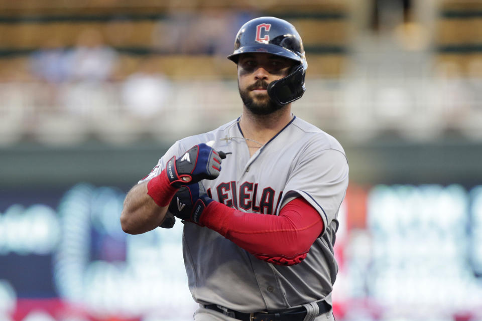 Cleveland Guardians' Austin Hedges flexes after hitting a home run against the Minnesota Twins during the fifth inning of a baseball game Wednesday, June 22, 2022, in Minneapolis. (AP Photo/Andy Clayton-King)