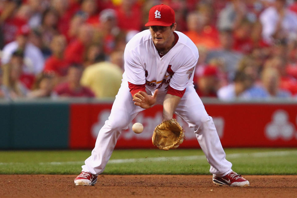 ST. LOUIS, MO - MAY 25: David Freese #23 of the St. Louis Cardinals fields a one hopper against the Philadelphia Phillies at Busch Stadium on May 25, 2012 in St. Louis, Missouri. (Photo by Dilip Vishwanat/Getty Images)