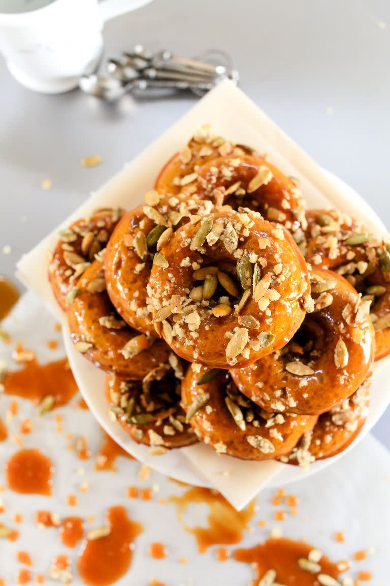 <p>Each bite of these caramel-covered doughnuts have a sweet crunch, thanks to candied pepitas.<br></p><p><strong><a href="https://www.thepioneerwoman.com/food-cooking/recipes/a80231/pumpkin-spiced-donuts-with-bourbon-caramel-glaze/" rel="nofollow noopener" target="_blank" data-ylk="slk:Get the recipe.;elm:context_link;itc:0;sec:content-canvas" class="link ">Get the recipe.</a></strong> </p><p><a class="link " href="https://go.redirectingat.com?id=74968X1596630&url=https%3A%2F%2Fwww.walmart.com%2Fsearch%2F%3Fquery%3Ddonut%2Bpans&sref=https%3A%2F%2Fwww.thepioneerwoman.com%2Ffood-cooking%2Fmeals-menus%2Fg33565118%2Fpumpkin-dessert-recipes%2F" rel="nofollow noopener" target="_blank" data-ylk="slk:SHOP DONUT PANS;elm:context_link;itc:0;sec:content-canvas">SHOP DONUT PANS</a></p>