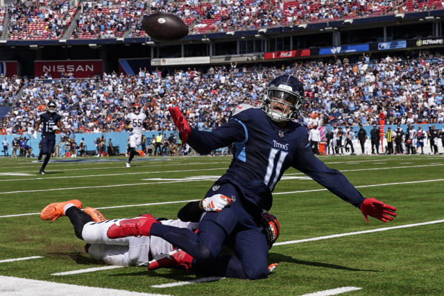 of the Denver Broncos runs the ball against the Cincinnati Bengals