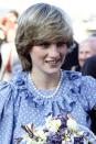 <p>Showing off her elegant shag cut while being presented flowers in the Scilly Islands, England. </p>