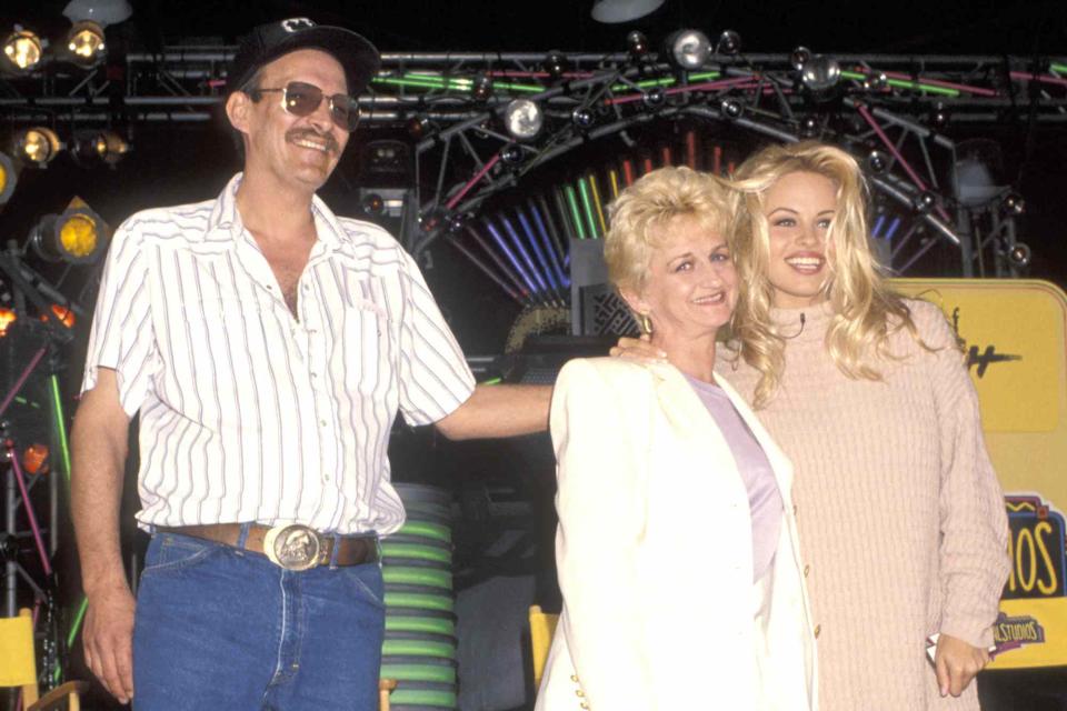 <p>Ron Galella, Ltd./Ron Galella Collection/Getty</p> Pamela Anderson and her parents.