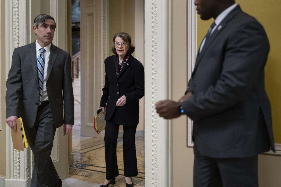 FILE - Sen. Dianne Feinstein, D-Calif., arrives for the Senate Democratic Caucus leadership election at the Capitol in Washington, Thursday, Dec. 8, 2022. Feinstein is not seeking reelection in 2024. Her announcement Tuesday, Feb. 14, 2023, signals the end of a groundbreaking political career spanning six decades in which she shattered gender barriers and left a mark on political battles over reproductive rights, gun control and environmental protection. (AP Photo/J. Scott Applewhite, File)