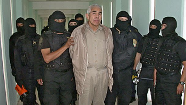 PHOTO: Members of the PFP escort drug trafficker Rafael Caro Quintero, at the Puente Grande prion in Guadalajara, Mexico, Jan. 29, 2005. (Mexican Federal Police/AFP via Getty Images)