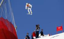 Ted Ligety of the U.S. competes in the downhill run of the men's alpine skiing super combined event at the 2014 Sochi Winter Olympics, February 14, 2014. REUTERS/Stefano Rellandini