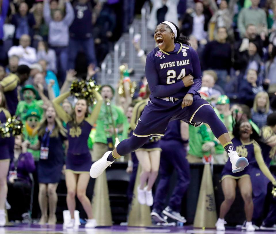 Notre Dame's Arike Ogunbowale, a 2015 Divine Savior Holy Angels graduate, celebrates after making a game-winning shot in overtime over Connecticut on March 30, 2018, to send the Irish to the national championship game. Two days later, Ogunbowale hit another game-winning shot - this time a 3-pointer against Mississippi State - that gave Notre Dame its second national title.