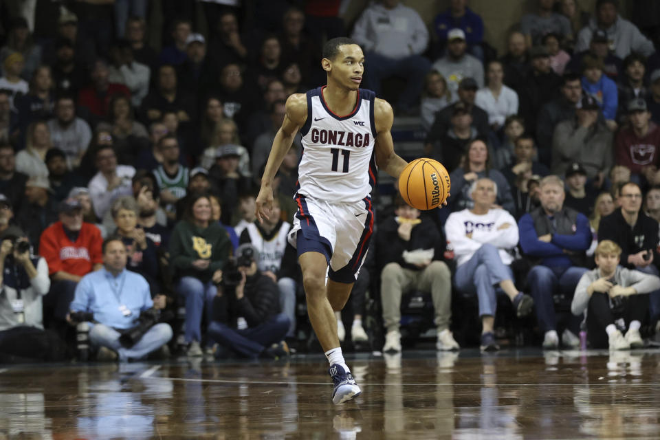 Gonzaga guard Nolan Hickman (11) brings the ball upcourt during the first half of an NCAA college basketball game against Baylor, Friday, Dec. 2, 2022, in Sioux Falls, S.D. (AP Photo/Josh Jurgens)