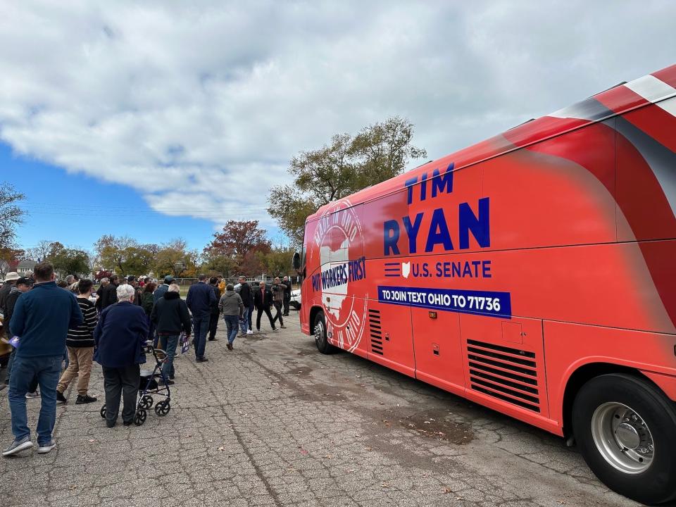 Ryan's bright red campaign bus at a park in Loraine, OH on October 27, 2022.
