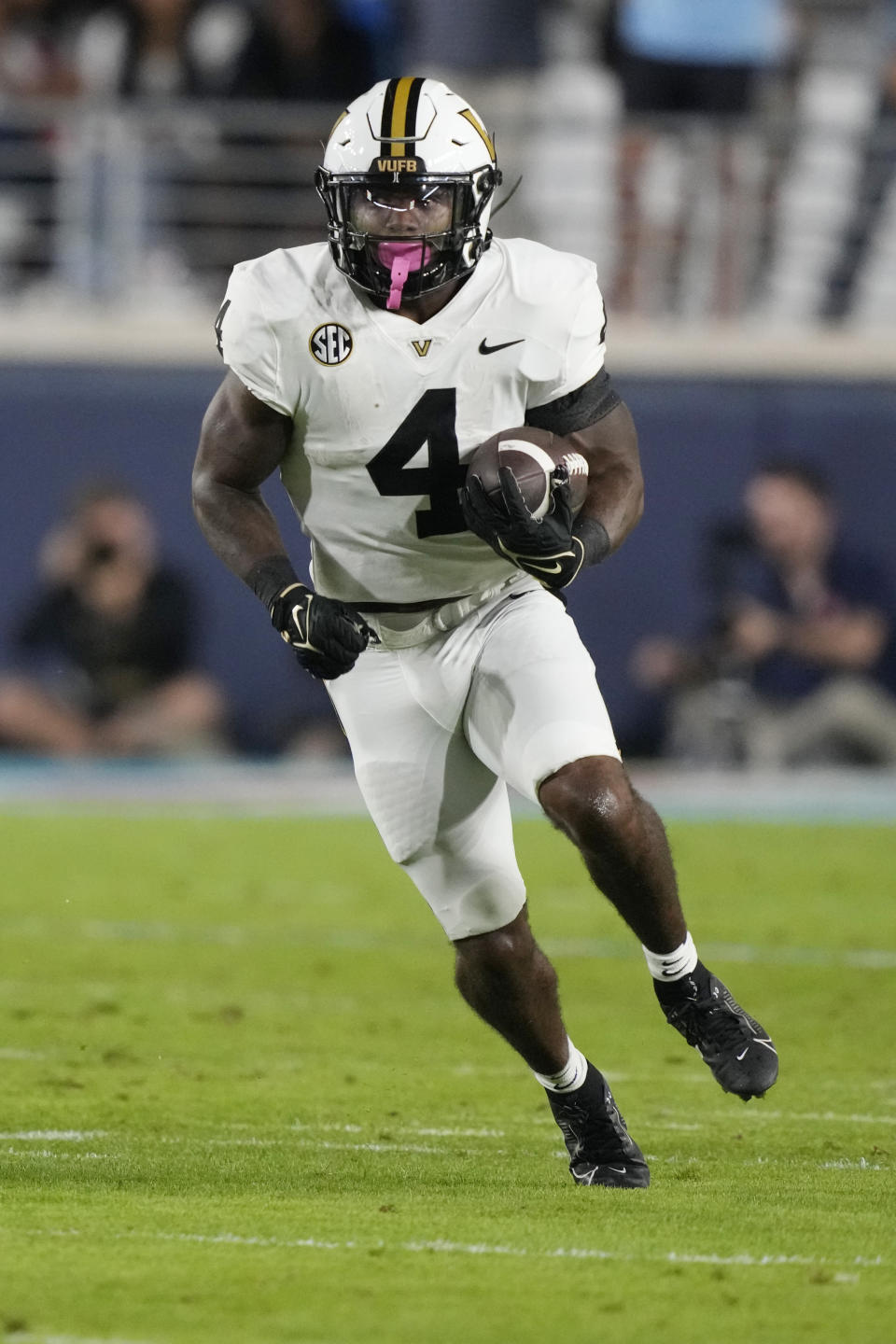 Vanderbilt running back Patrick Smith (4) finds running room against Mississippi during the second half of an NCAA college football game in Oxford, Miss., Saturday, Oct. 28, 2023. (AP Photo/Rogelio V. Solis)