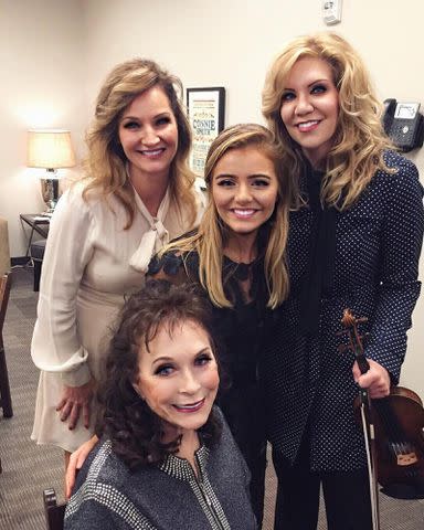 <p>Emmy Russell Instagram</p> Loretta Lynn with her daughter Patsy Lynn Russell and granddaughter Emmy Russell and country singer Alison Krauss.