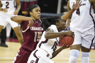 South Carolina forward Laeticia Amihere, front, drives to the hoop past Charleston forward Arynn Eady (15) during the first half of an NCAA college basketball game against Charleston, Wednesday, Nov. 25, 2020, in Columbia, S.C. (AP Photo/Sean Rayford)