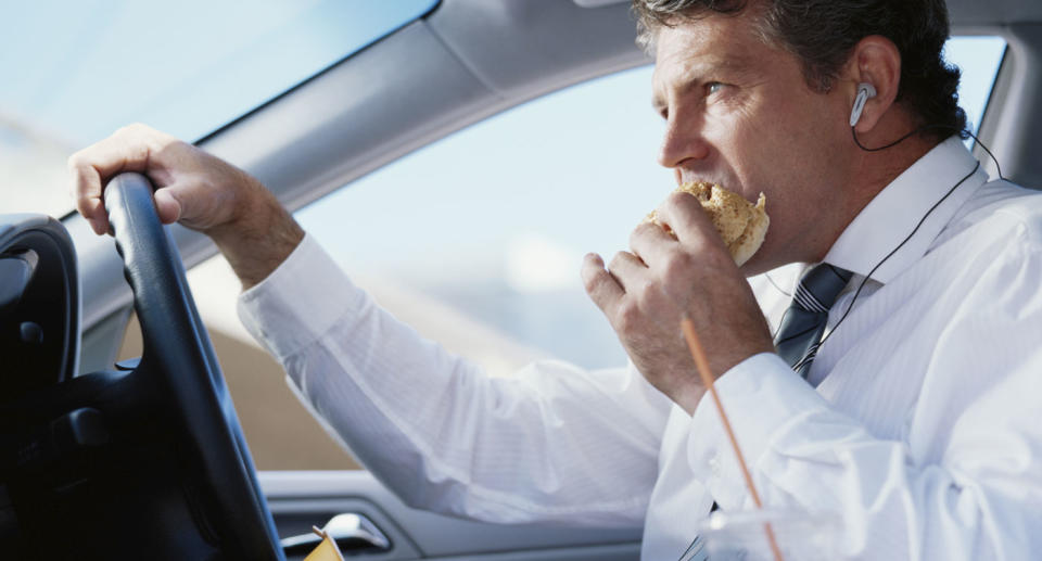 The Safe Driving Report 2018, written by Finder.com.au, claims 38 per cent of Australians eat fast food while driving. File pic. Source: Getty Images