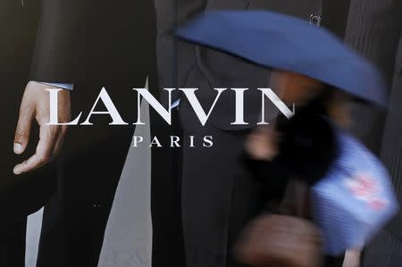 A woman walks past a Lanvin store in Paris, France, January 12, 2017. REUTERS/Christian Hartmann