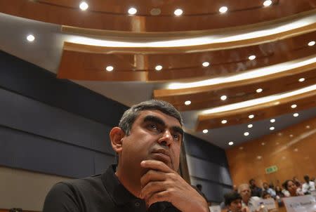 Infosys' newly appointed chief executive officer Vishal Sikka attends a news conference at company's headquarters in the southern Indian city of Bangalore June 12, 2014. REUTERS/Stringer