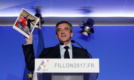 Francois Fillon, former French prime minister, member of the Republicains political party and 2017 presidential candidate of the French centre-right, attends a news conference to present his "project for France" in Paris, France, March 13, 2017. REUTERS/Philippe Wojazer