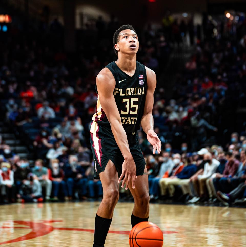 Matthew Cleveland prepares to shoot a free throw as the FSU men's basketball team plays at Virginia on Feb. 26, 2022.