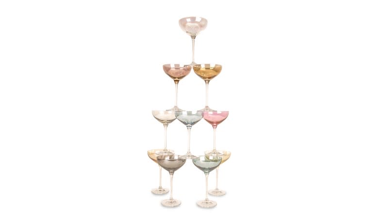 10 assorted Champagne saucers, £85