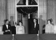 <p>The Queen and Prince Philip, joined by Prince Charles and second-eldest child Princess Anne, wave to crowds during her Silver Jubilee.</p> 