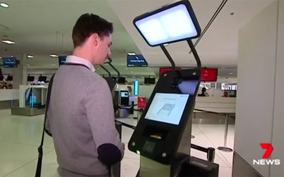 A man uses facial recognition technology at bag drop. Source: 7 News