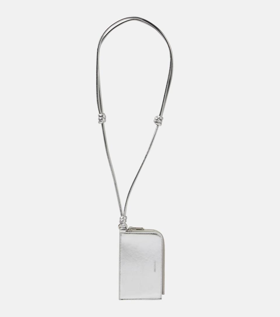 Jill Sander Envelope leather card holder with strap. (PHOTO: MyTheresa)