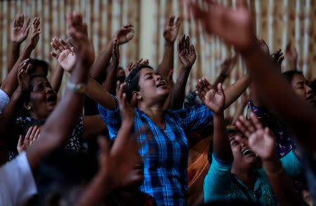 Members of Zion Church, which was bombed on Easter Sunday, pray at a community hall in Batticaloa, Sri Lanka, May 5, 2019. REUTERS/Danish Siddiqui