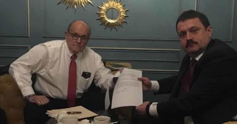Ukrainian lawmaker Derkach attends a meeting with U.S. lawyer Giuliani in Kiev